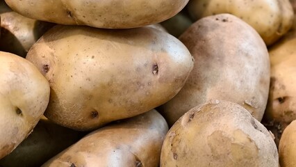 Fresh Potatoes Piled Up in a Rustic Market Display