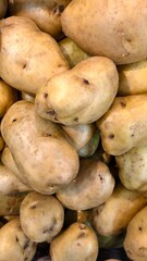 Close-Up of Rustic Potatoes Piled Together for Sale