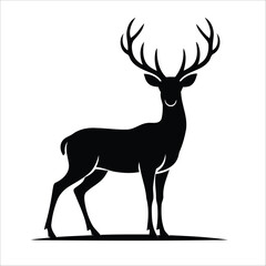 Obraz premium Silhouette of a deer in a standing position, showcasing large, branching antlers. The image is monochromatic,