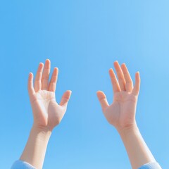 Hands reaching toward sky