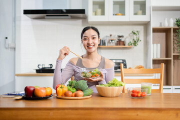 Fit woman enjoys healthy fruit breakfast after yoga training. fitness, nutrition, healthy lifestyle.