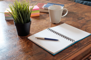 still life of office supplies isolated on wooden background