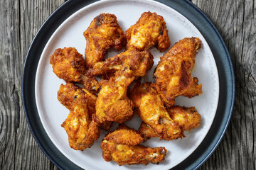 crispy fried chicken wings on a plate