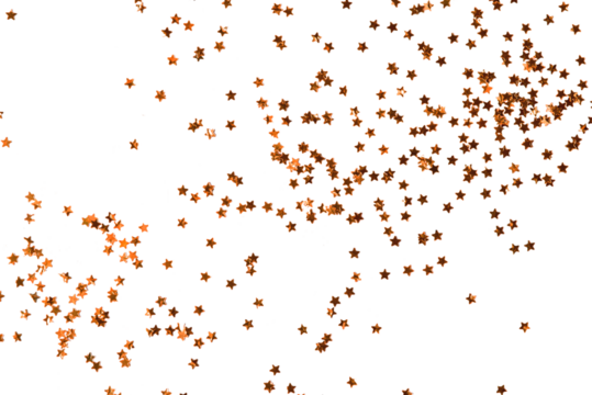 Festive golden stars of confetti isolated on a transparent background.