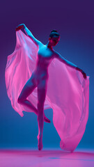 Dynamic photo of young ballerina dressed in white costume performing expressive leap with pink cloth swirling around body in neon light against gradient background. Concept of beauty, dance, music