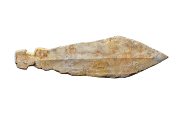 Ancient arrowhead with worn edges and historical relevance displayed clearly on a white background