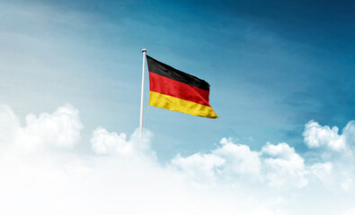 Germany national flag with mast waving in beautiful sky. Germany flag for Republic Day and Independence Day.