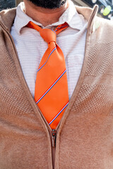 orange tie white shirt Netherlands birthday close-up king day