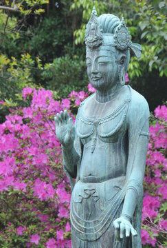 A statue known as Yumechigai ("Dream Changer") Kannon at Setagaya Kannon-ji, a Buddhist temple in Tokyo, Japan.
