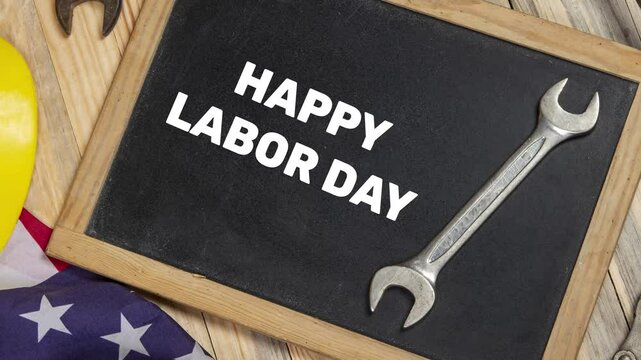 Happy Labor Day banner with United States of America flag and tools to honor the laborers