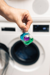 capsule for washing machine, cleaning, women's housework, liquid eco-detergent for washing dirty laundry, washing powder, housework, cleanliness in the house, capsule for washing in hands