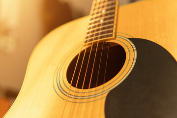 close up of an acoustic guitar with no people