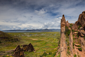 Reddish rock formations in Aramu Muru near Puno in Peru