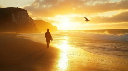 Fototapeta premium A person strolls along the beach at sunset, waves gently lapping at the shore with a bird flying above, creating a serene atmosphere.