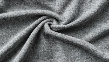 Fototapeta premium Close-up of gray fabric with natural wrinkles and soft texture.