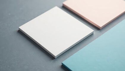 Close up of blank square and rectangle cards on textured grey background for graphic design, blank, square, textured