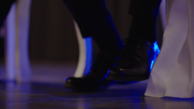Bride stepping on groom's foot during marriage ceremony