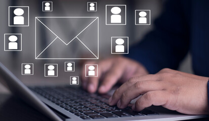 Use laptop computer and send message, send email online with email icon, email marketing concept, send email or newsletter, internet network work online