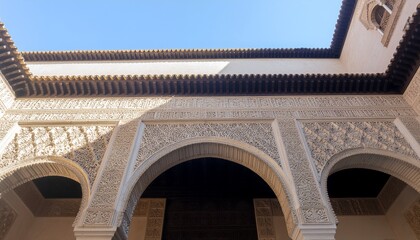 A series of weathered stone arches lines a sunlit corridor, each evenly spaced on robust columns. Moss and lichen accentuate the ancient masonry, evoking historical grandeur and architectural rhythm