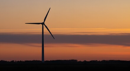 Silhouette of a Wind Turbine at Sunset Clean Energy and Renewable Power Generation