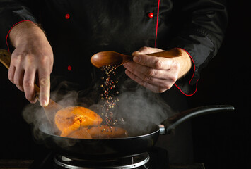 A skilled chef is seasoning vibrant seasonal vegetables in a frying pan. The scene showcases...