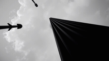 A dramatic black and white low-angle perspective shot, looking upward.jpg
