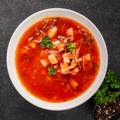Red soup vegetables borscht first course vegetable dish fresh gourmet food background on the table rustic food top view copy space keto and paleo diet vegetarian vegan food