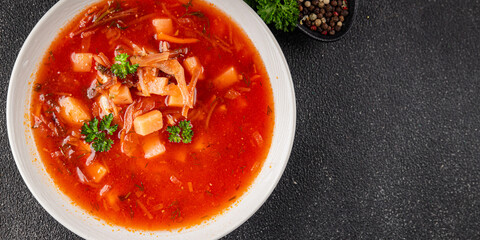 Red soup vegetables borscht first course vegetable dish fresh gourmet food background on the table rustic food top view copy space keto and paleo diet vegetarian vegan food