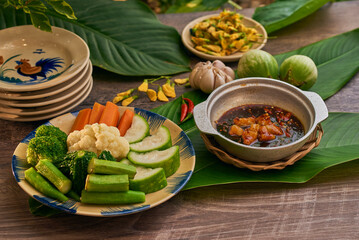Traditional Vietnamese Food in wooden table with Green background
