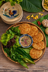 Traditional Vietnamese Food in wooden table with Green background

