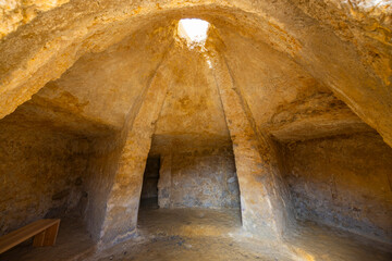 Interior of a tholos tomb showing corbelled dome and columns in Carmona, Spain © Richard Semik