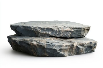Two flat gray rocks stacked on top of each other against a plain white background in a studio shot