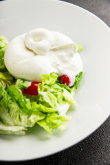 Salad burrata cheese buffalo milk cheese salad dish fresh gourmet food background on the table rustic food top view copy space keto and paleo diet vegetarian
