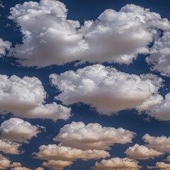 Obraz premium Majestic airplane flying high in the clear blue sky with soft white clouds in the background
