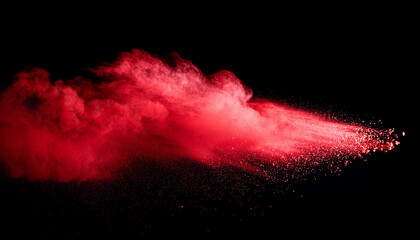 a red cloud of powder on black background