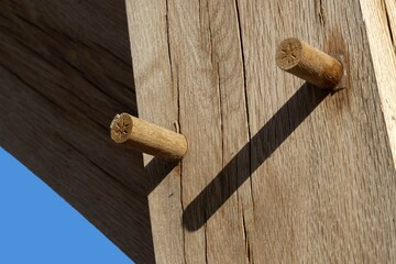Oak wood condstruction of a house or barn. Architecture. Craft.