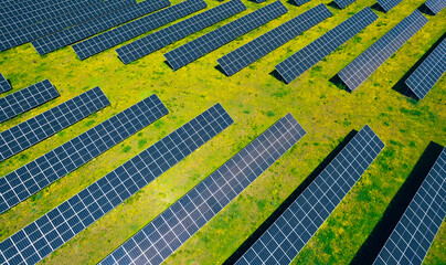 Alternative power source to saving environment.Solar panels park generating green energy electric.Green energy reduce carbon emissions and makes earth cleaner and more ecological.	
