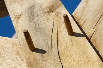 Oak wood condstruction of a house or barn. Architecture. Craft.