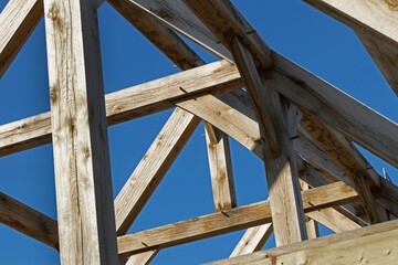 Oak wood condstruction of a house or barn. Architecture. Craft.