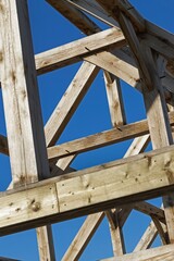 Oak wood condstruction of a house or barn. Architecture. Craft.