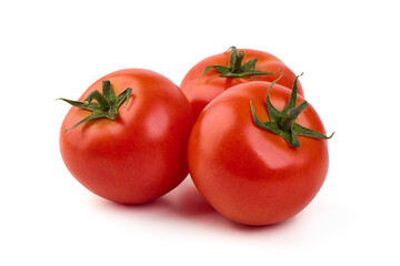 Ripe fresh tomatoes, close-up, isolated on white background.