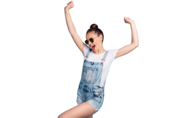 Portrait of cheerful youth with eyeglasses eyewear screaming raising hands wearing white t-shirt denim jeans overalls isolated over blue background