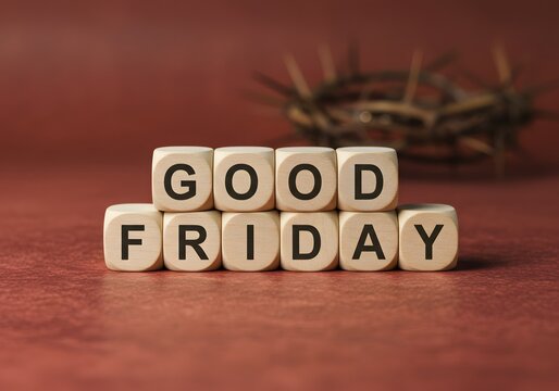 Good Friday message on wooden blocks with a crown of thorns in the background