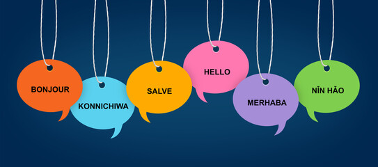 Paper speech bubbles with greetings in different languages hanging on dark blue background. Banner design © New Africa