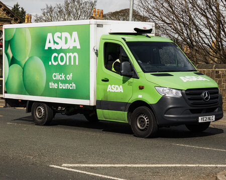 The green and white vans with the logo of supermarket giant Asda are now regularly seen delivering orders to the homes of customers for whom it is more convenient 