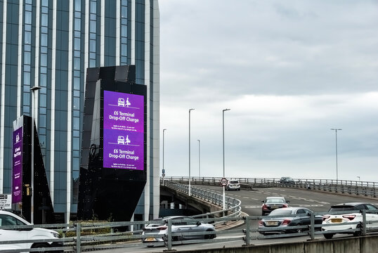 Motorway to terminal 2, Heathrow Airport, Hilton Garden Inn, passengers drop off.