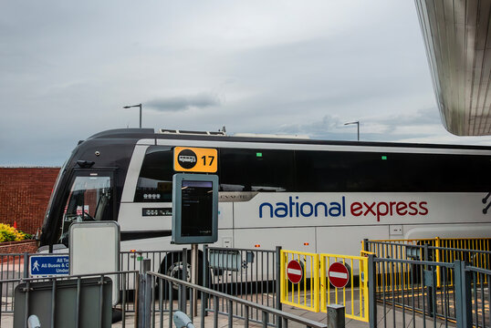 National Express bus standing on terminal 2 bus station and waiting for departure.