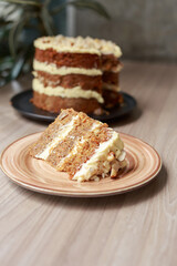 Carrot Cake with Cream Cheese Frosting Being Served