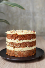 Carrot Cake with Cream Cheese Frosting Being Served
