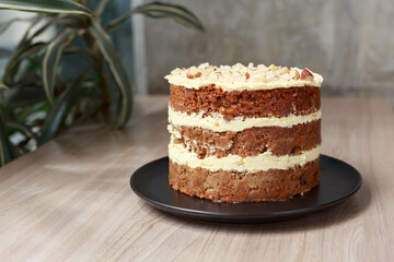 Carrot Cake with Cream Cheese Frosting Being Served